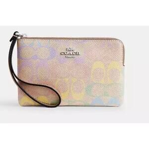 Coach Corner Zip Wristlet
In Signature Leather With Heart Charm